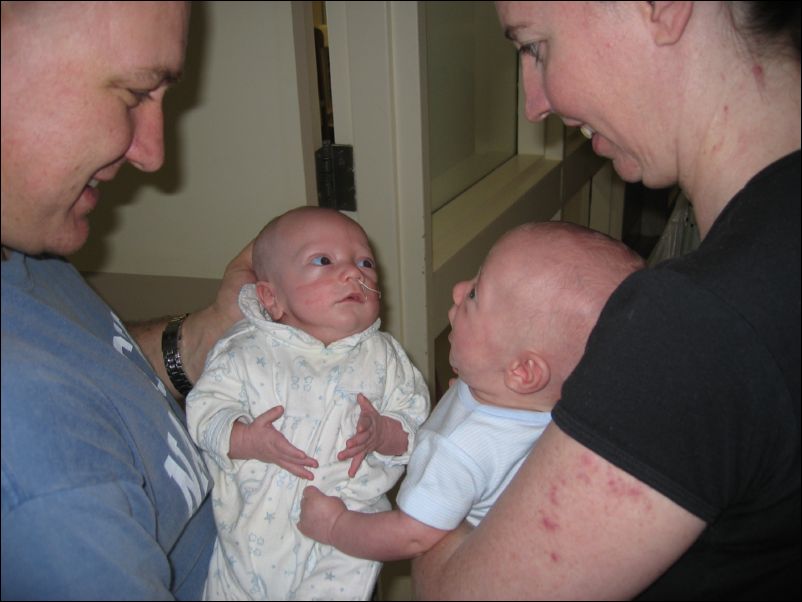 Brothers meeting for the first time out of the womb